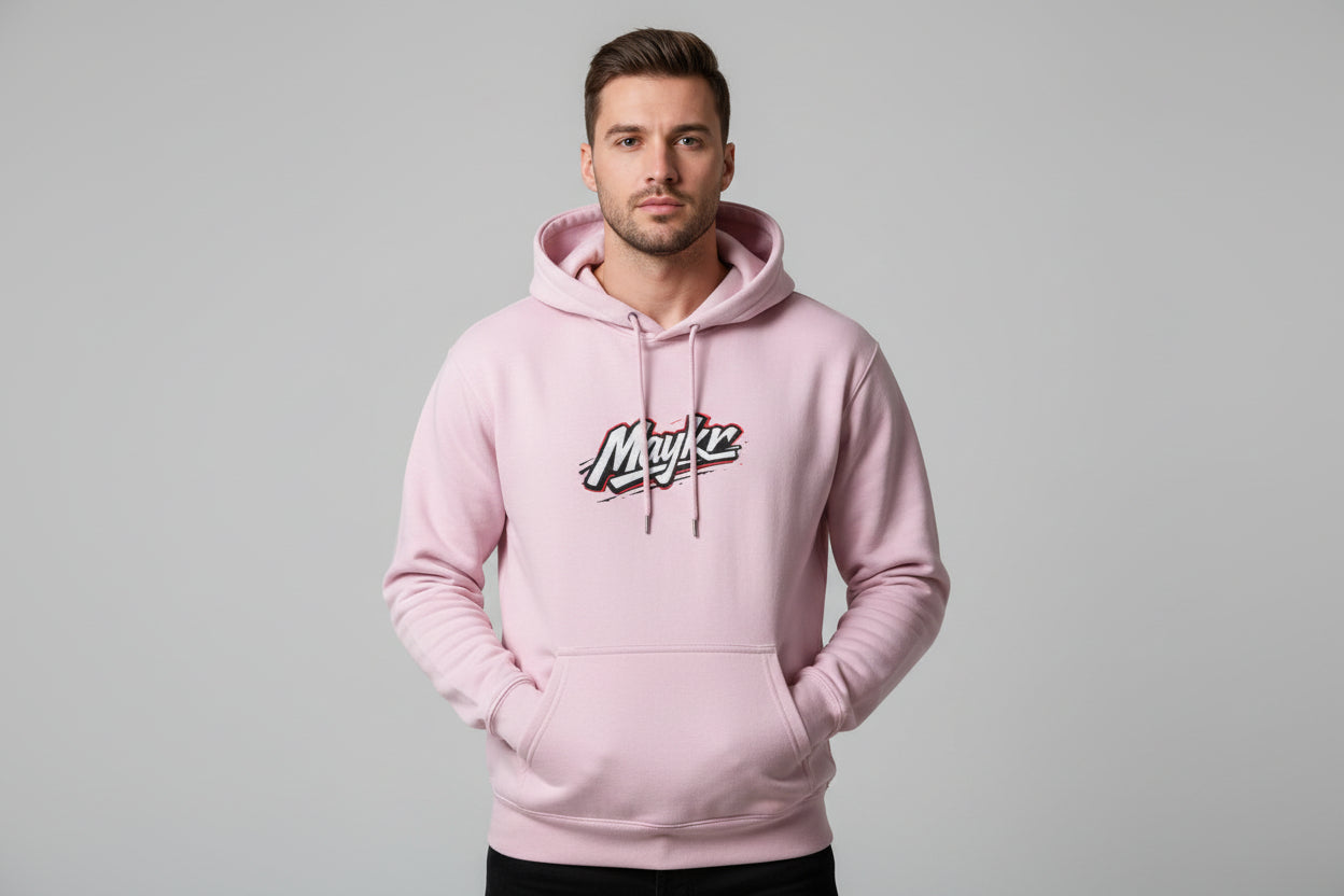 Male model wearing pink MAYKR Classic Trend Hoodie with logo, unisex regular fit and front kangaroo pocket.